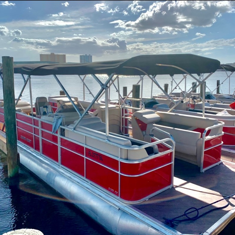 a boat is docked next to a body of water