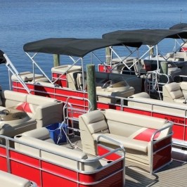 a boat parked next to a body of water