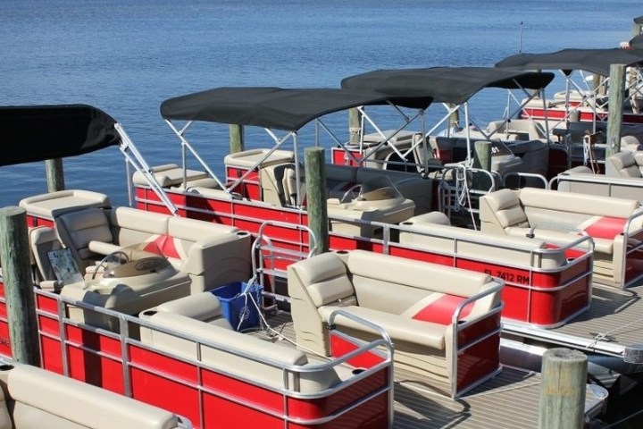 a boat parked next to a body of water