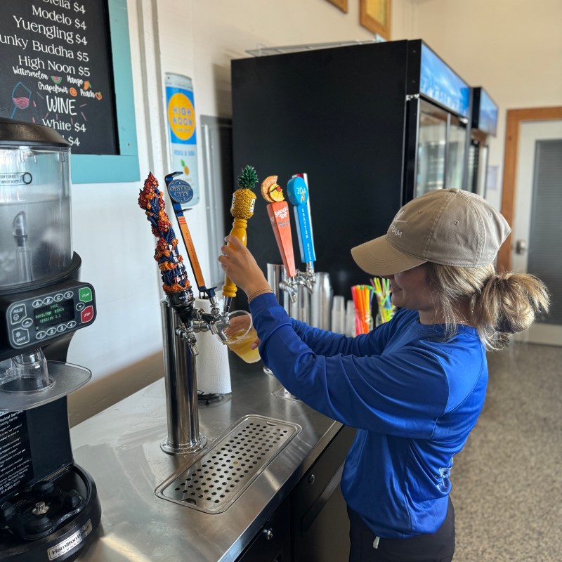 a person standing in front of a computer