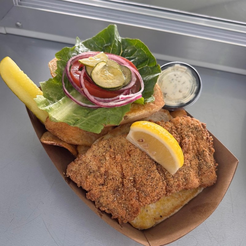 a sandwich sitting on top of a car