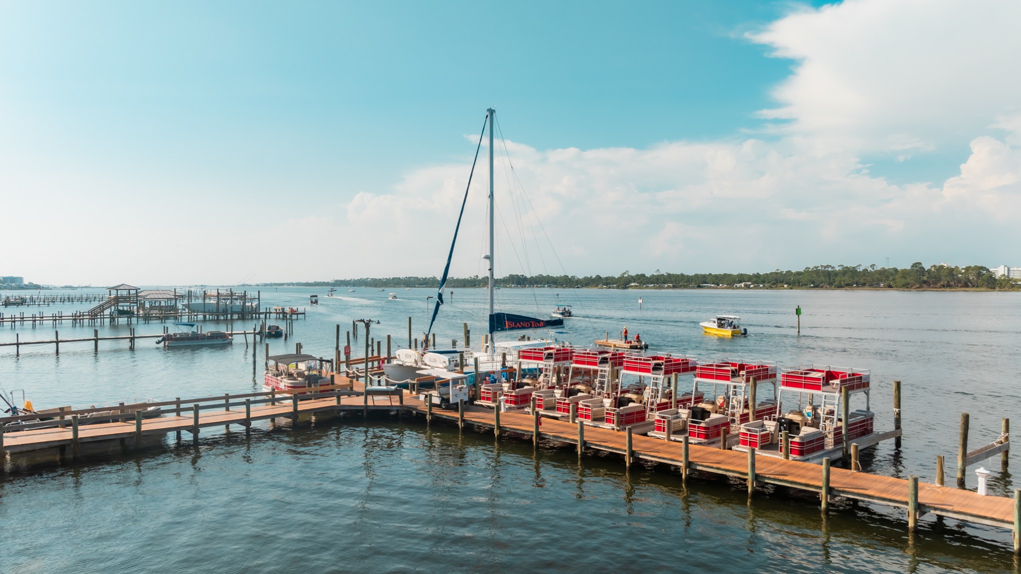 a boat is docked next to a body of water